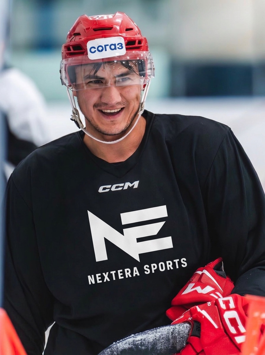 A NEXTERA athlete in a practice jersey during an on-ice session